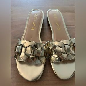 Woman Gold flat sandals size 6.5 gently used